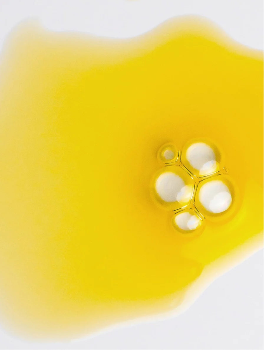 Noir & Gold™ Brightening Essence